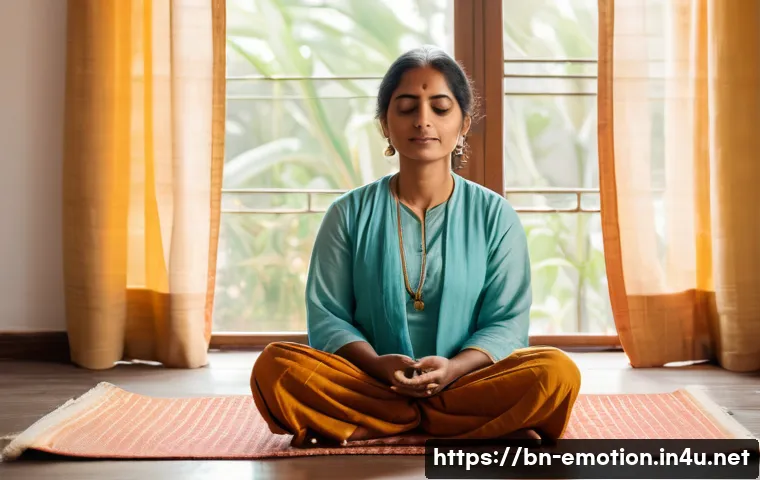 감정전이 인지 행동 치료 - A serene Bengali woman sitting cross-legged on a traditional mat indoors, practicing meditation with...